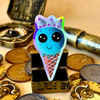 Bubblegum Ice Cream with a crown Holographic Sticker surrounded by treasure
