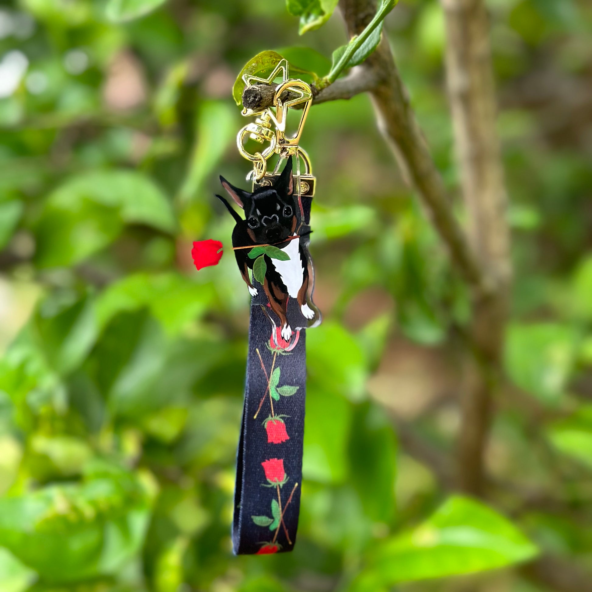 Chihuahua With her Rose Acrylic Keychain with a black Lanyard that has a rose pattern