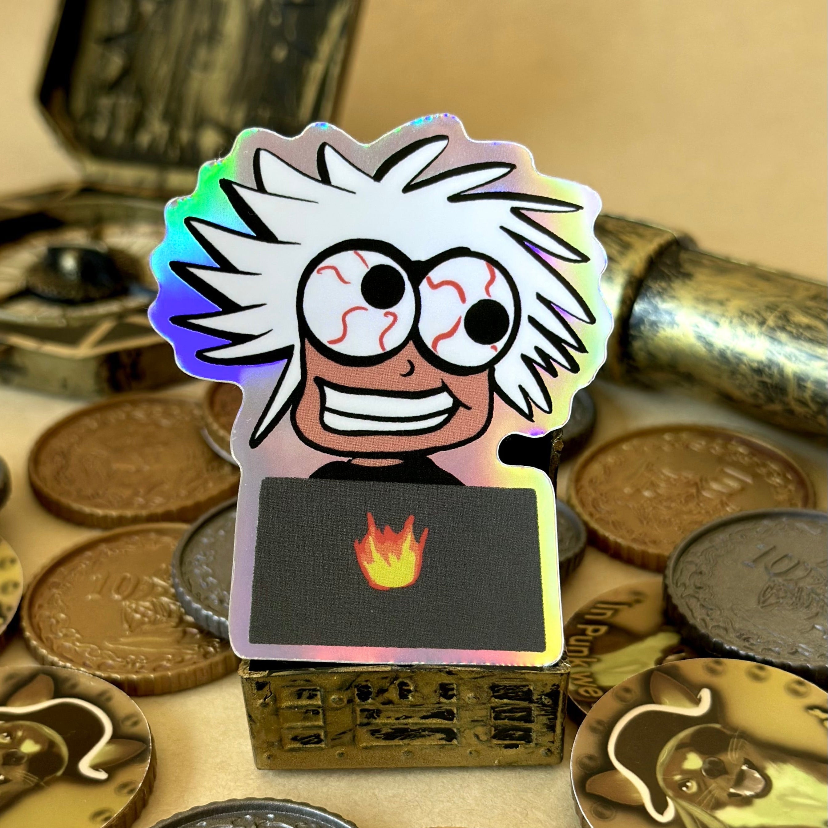 Holographic Sticker of a byrnt out creative in front of a laptop, strained eyes wild hair as treasures surround the sticker 