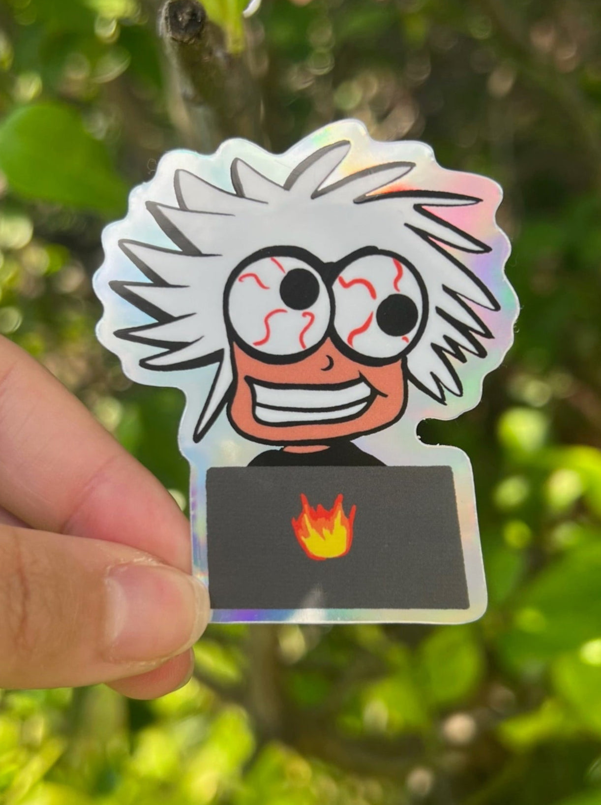 Creatively Burnt Out Individual  with wild hair and strained eyes on a laptop Holographic Sticker taken outdoors