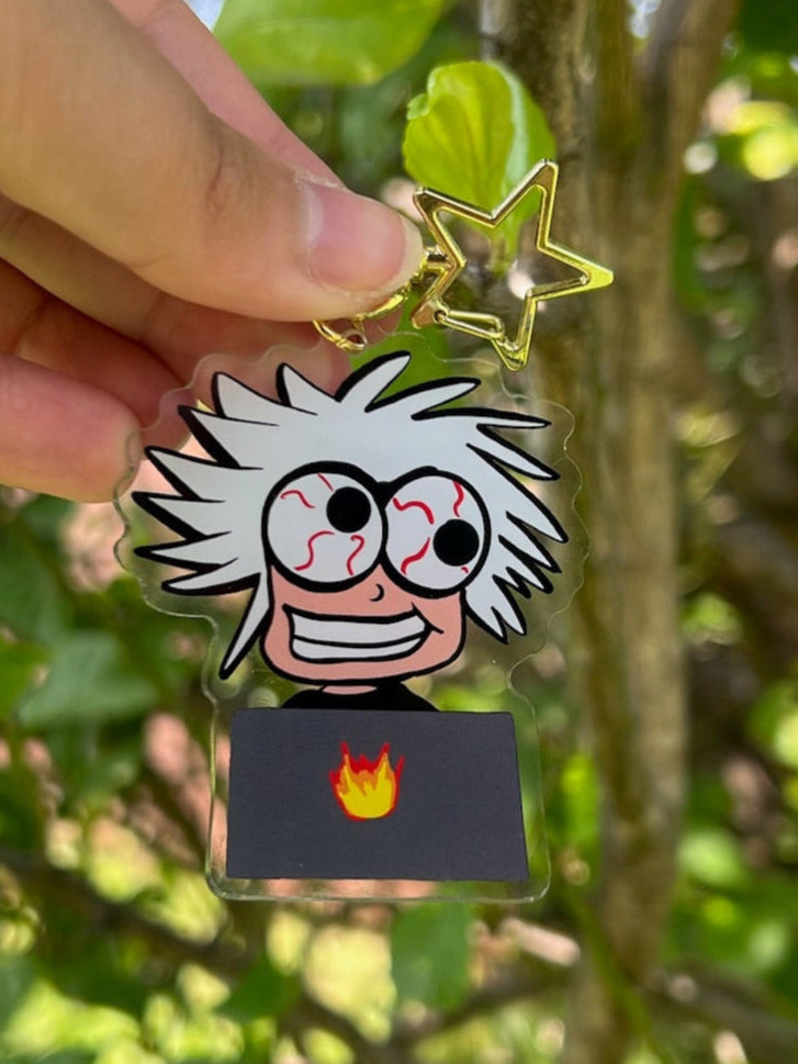 Creatively Burnt Out Individual with wild hair and strained eyes Acrylic Keychain Outdoor photo