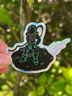 Falling Spaceman Holographic Sticker Outdoors