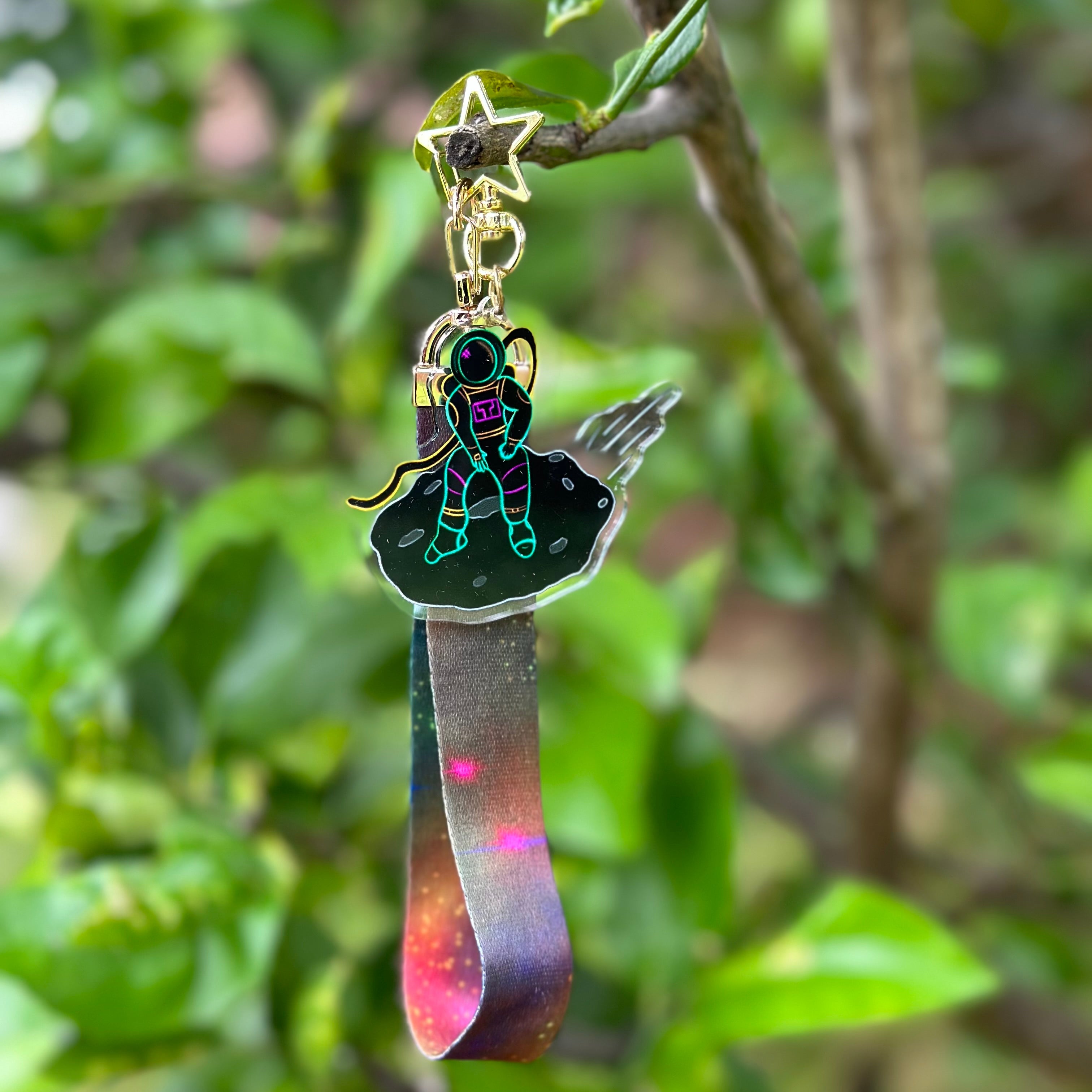 Falling Spaceman Acrylic Keychain with a space design Lanyard