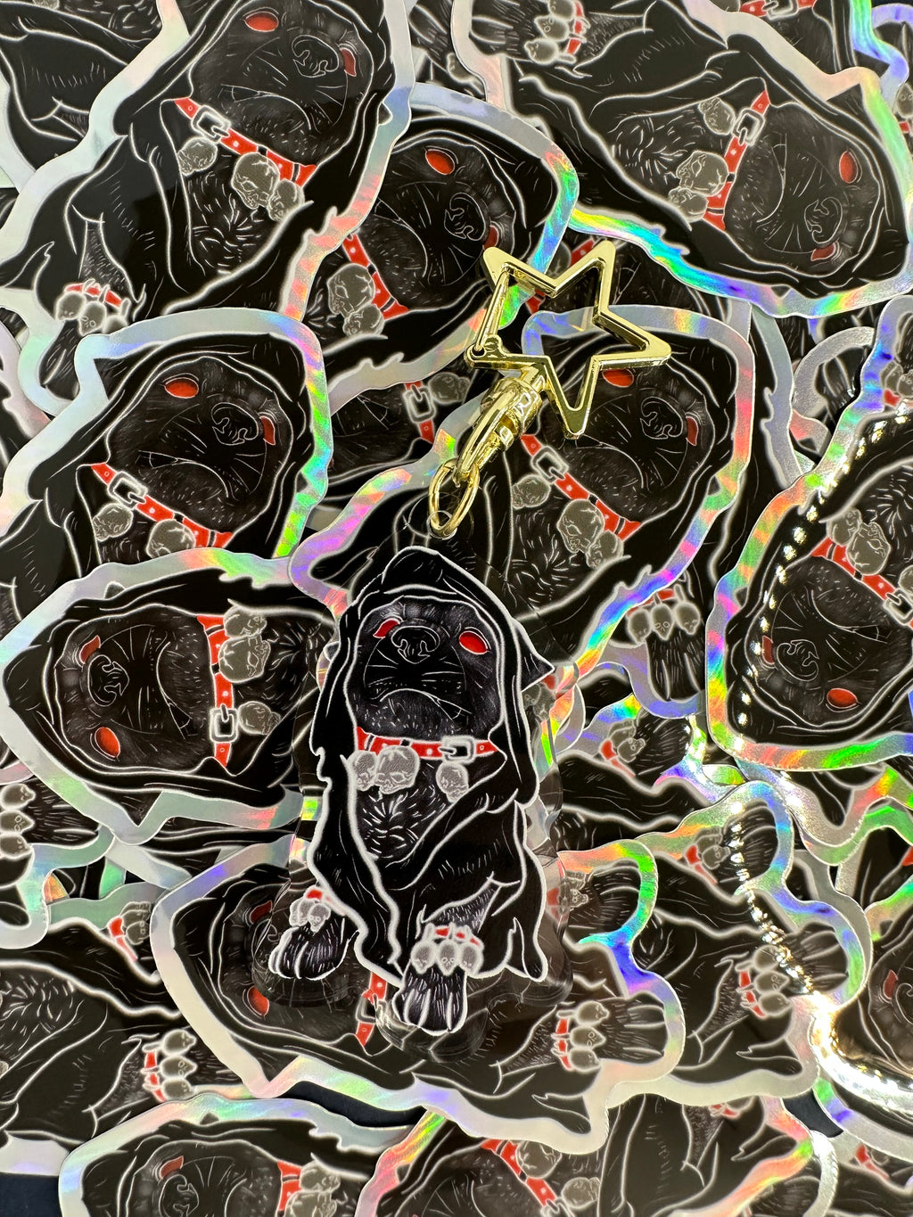 Stack Of Holographic and Acrylic Keychains of the Gothic Bulldog