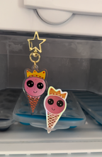 Ice Cream Queen Acrylic Keychain and Holographic Sticker in a fridge keeping cool, product spotlight