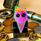 Straberry ice Cream with a crown holographic Sticker surrounded by treasure
