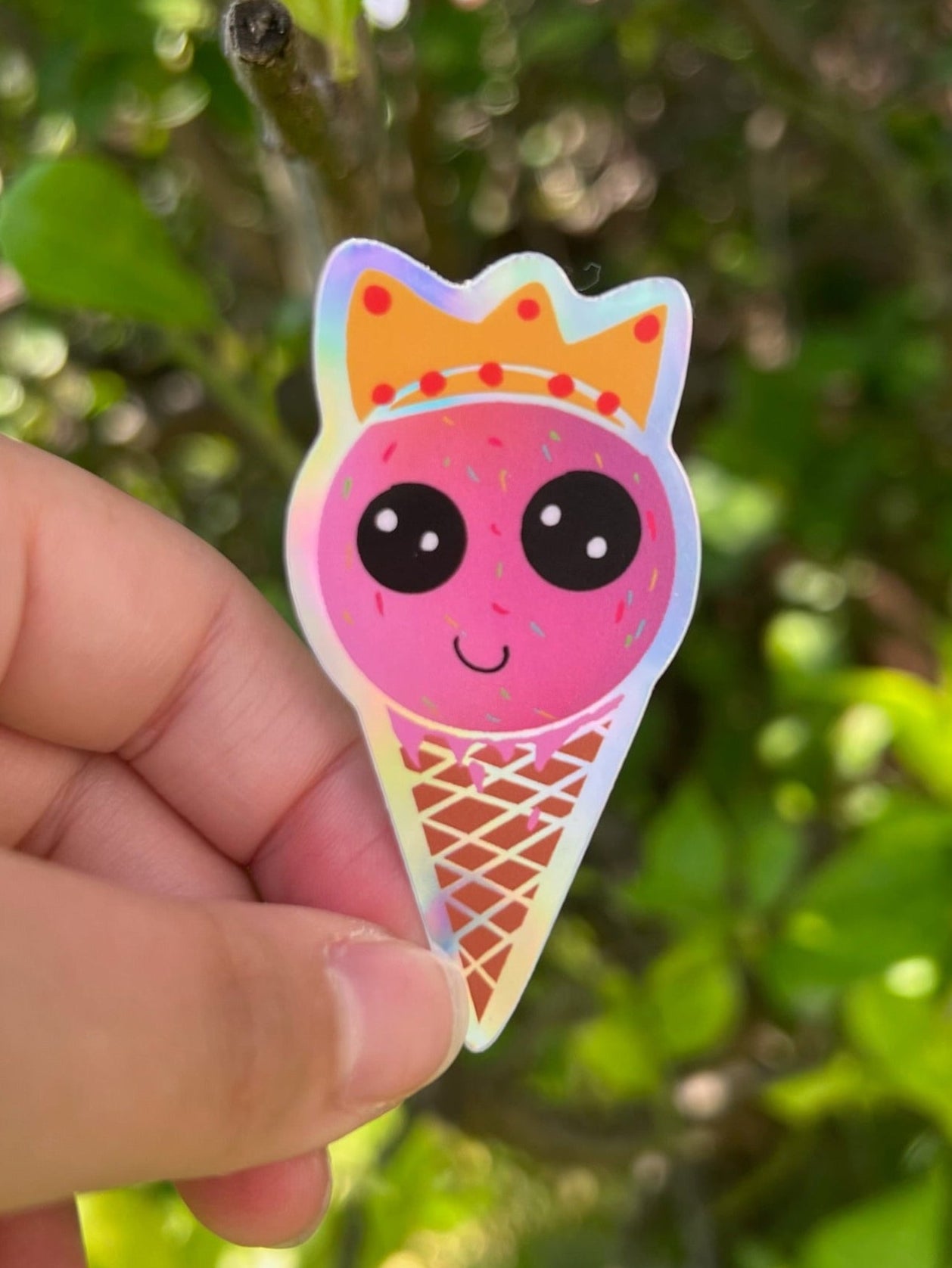 Strawberry Ice Cream Queen Kawaii Holographic Sticker taken Outdoors