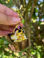 Outdoor photo of Golden Retriever Treasure Dog Acrylic Keychain with star clasp