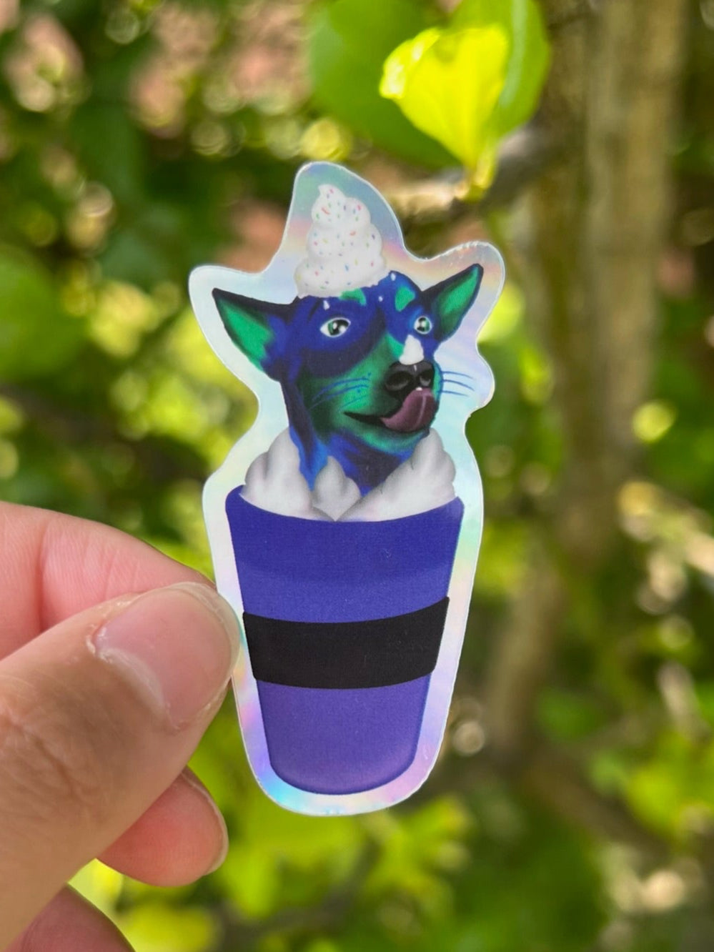 Pup Cup Rok the Blue Jack Russell Holographic Sticker taken outdoors
