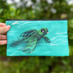 Sea Turtle swimming in the ocean with it's tongue sticking out Pouch