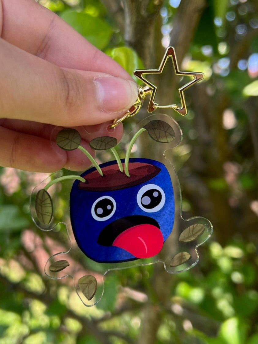 Thirsty Pot Plant Acrylic Keychain with a star clasp