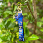Thirsty Pot Plant Acrylic Keychain with a Water your plants lanyard