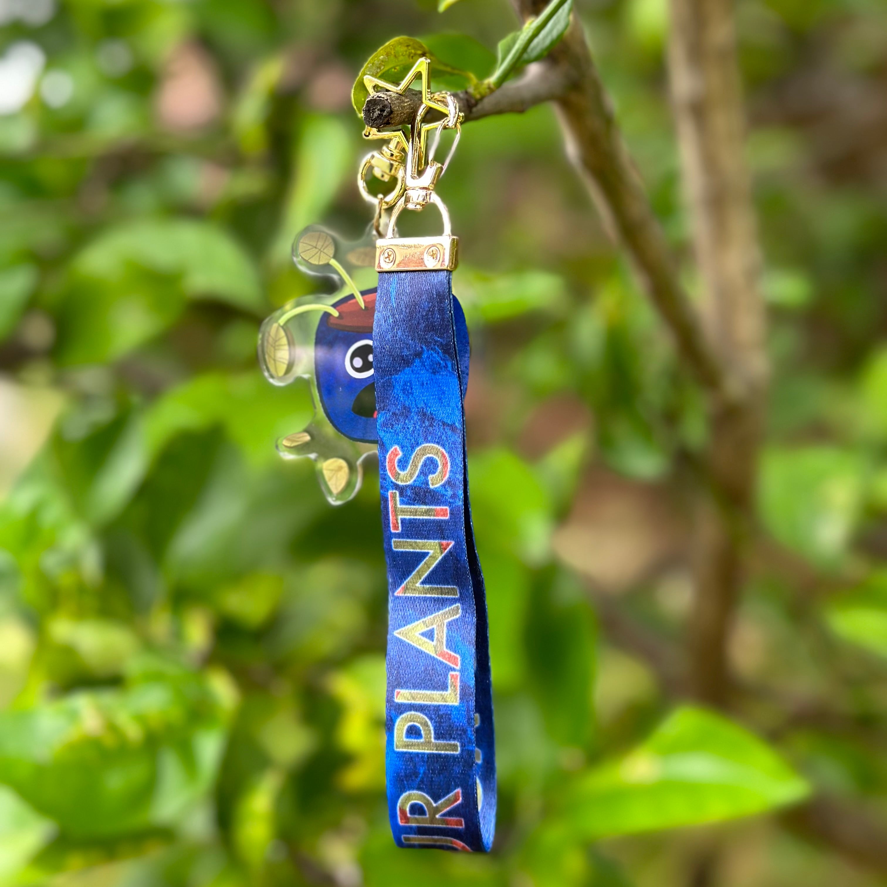 Thirsty Pot Plant Acrylic Keychain with a Water your plants lanyard