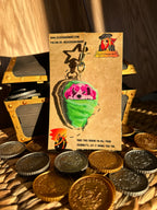  king cavalier sitting in Cotton Candy Acrylic Keychain surrounded by treasure