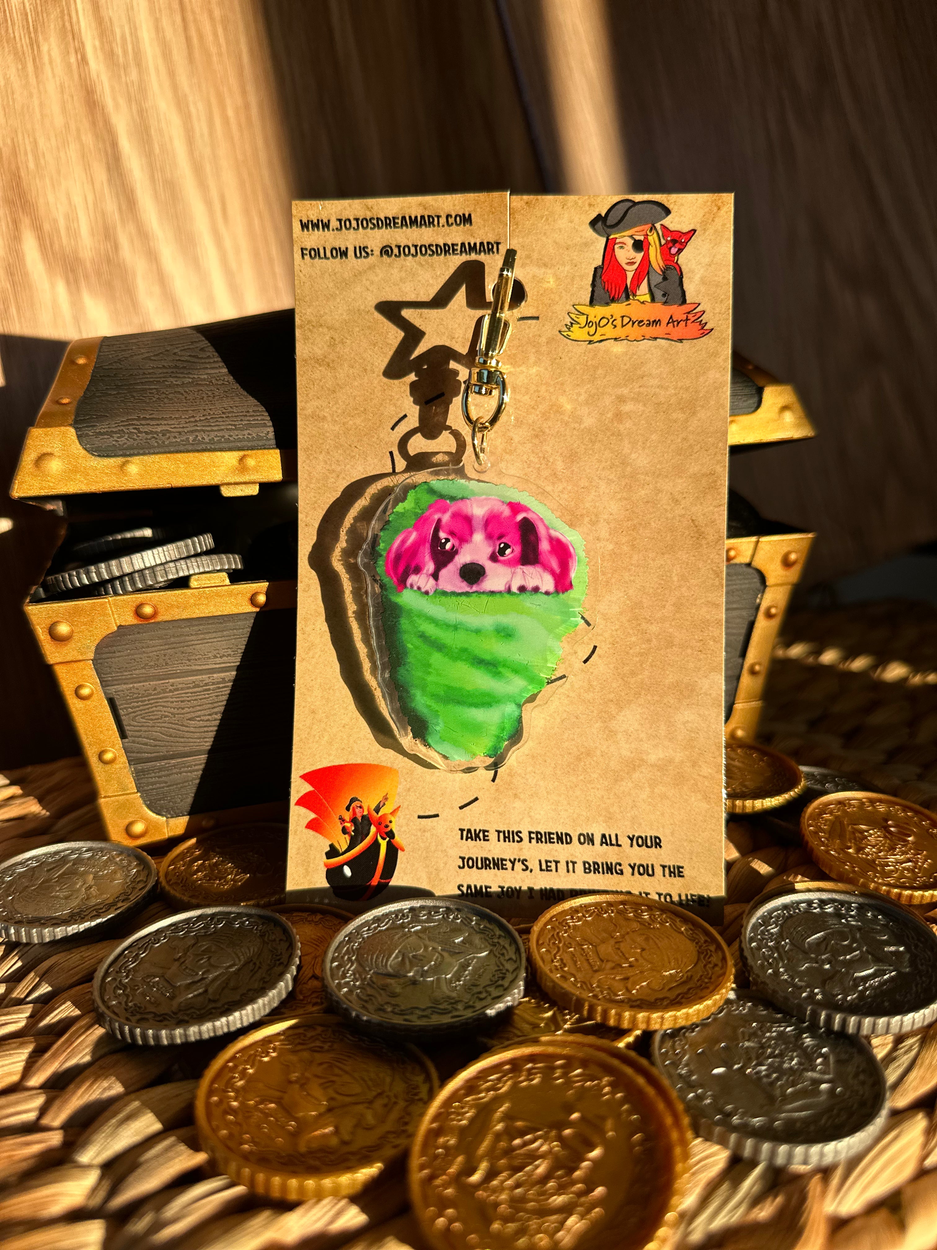  king cavalier sitting in Cotton Candy Acrylic Keychain surrounded by treasure